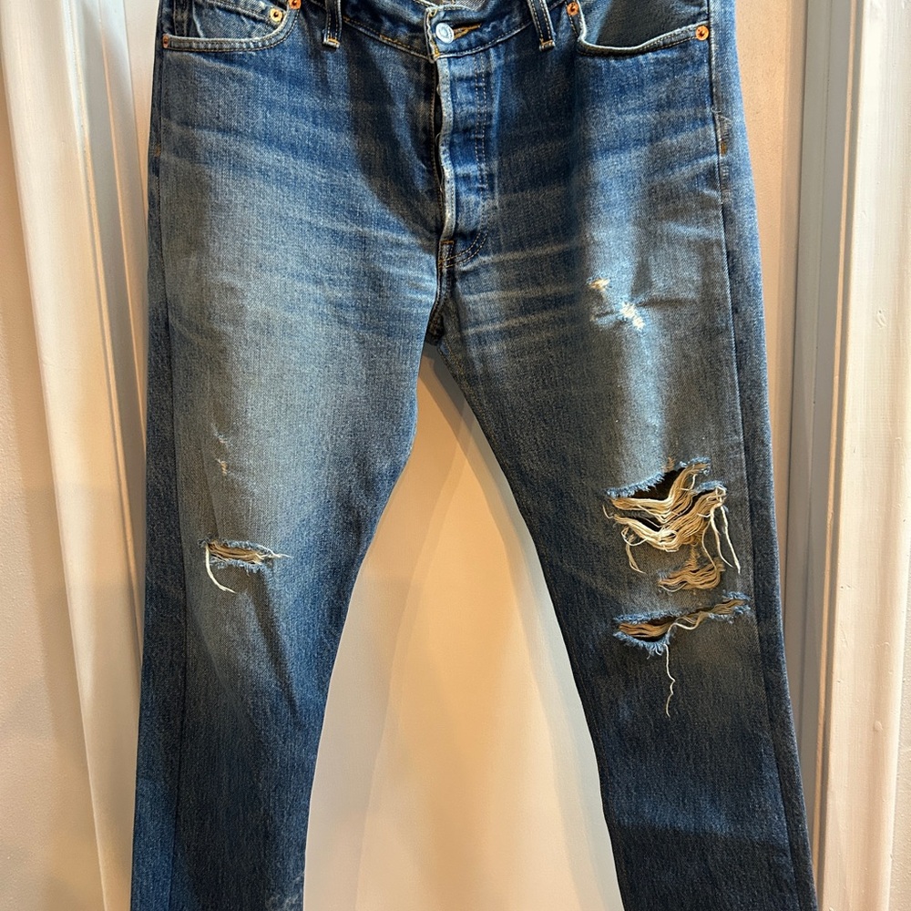 Re/Done Distressed Blue scrip Button Fly Jeans. Size 29.